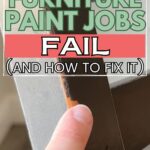 A finger on chipped paint on furniture