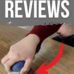 A hand using a SurfPrep sander on wood, with text SurfPrep Sander Reviews above.