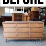 A worn wooden dresser with nine drawers in a garage, labeled BEFORE at the top.