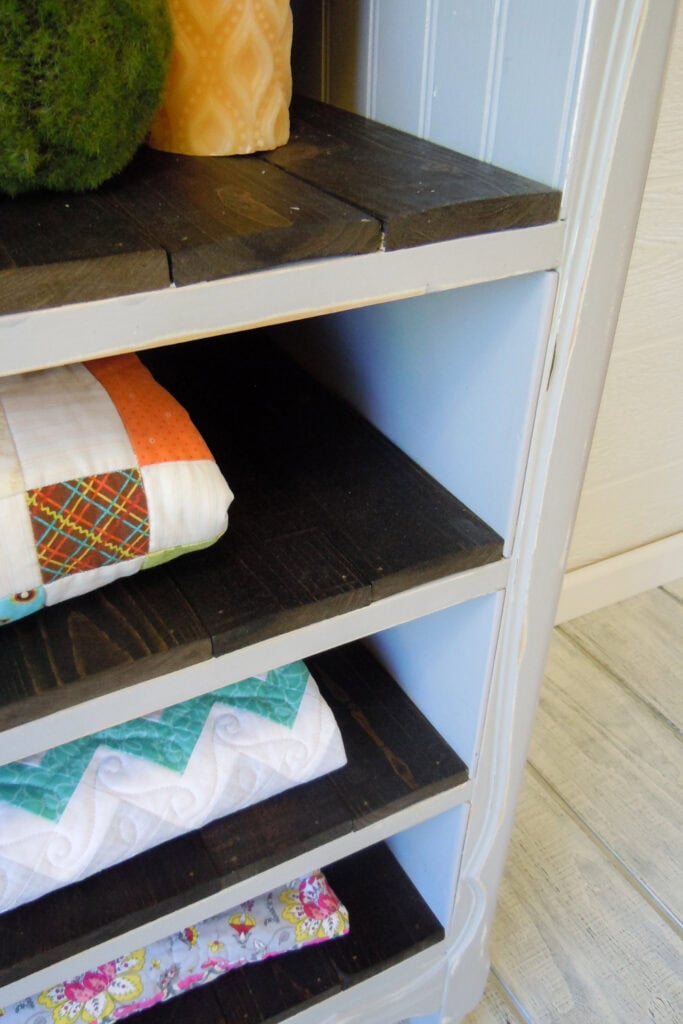Closeup of dark wooden shelves