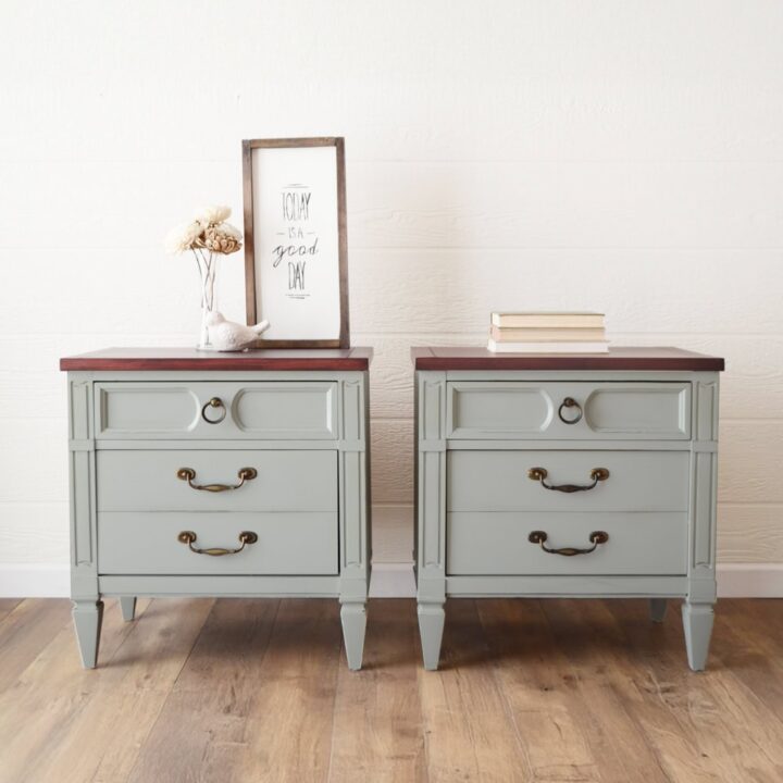 Two sage green nightstands with dark wood top