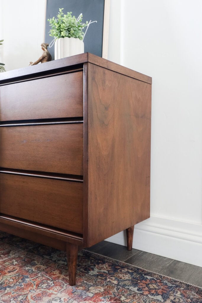Mcm wooden dresser with three drawers from the side