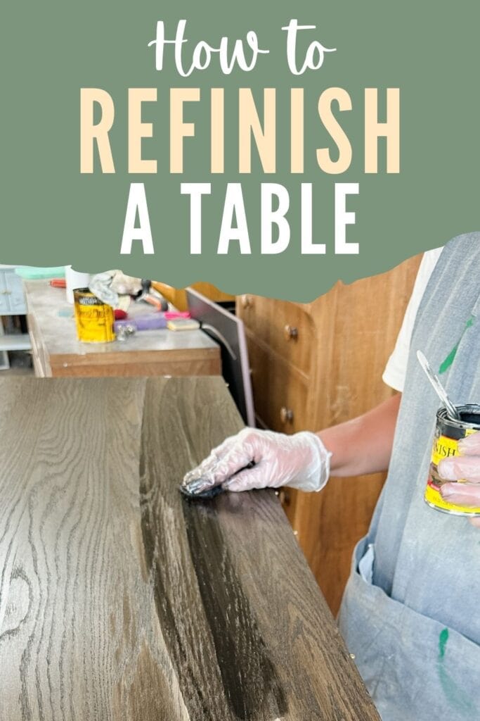 Wiping a wooden table with stain while wearing gloves