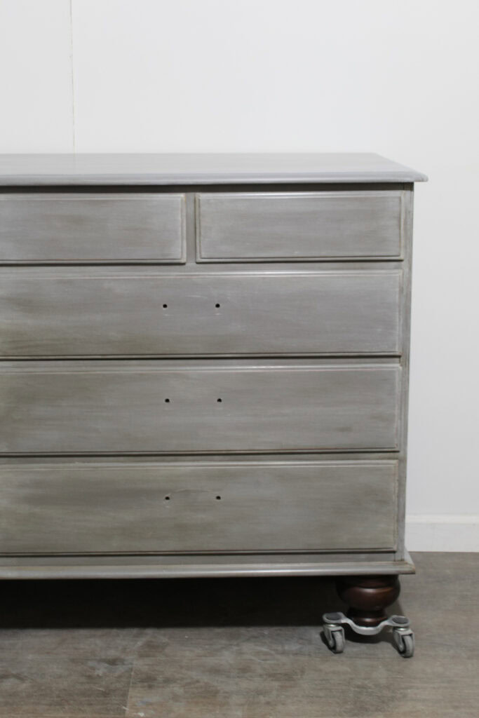 grey dresser with dark wax finish