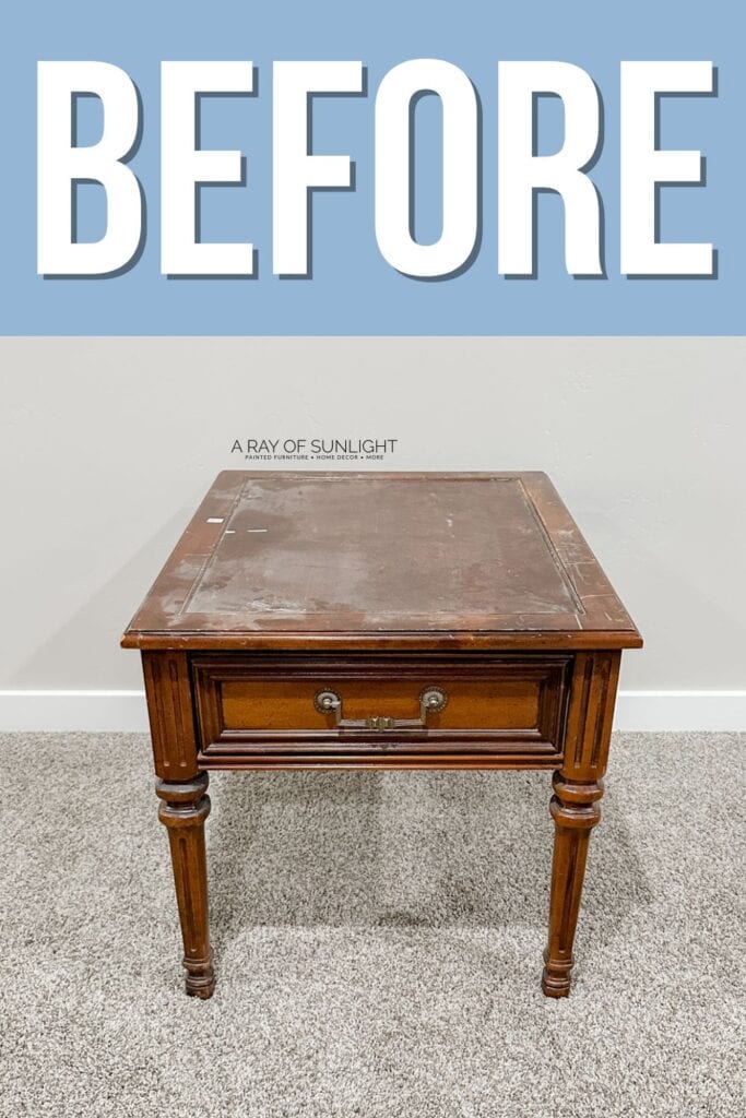 A worn wooden side table with a drawer, labeled BEFORE on a blue background.