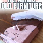 Close-up of old wooden furniture with pink and white filler applied to chipped edges; text: DIY tips for repairing old furniture.