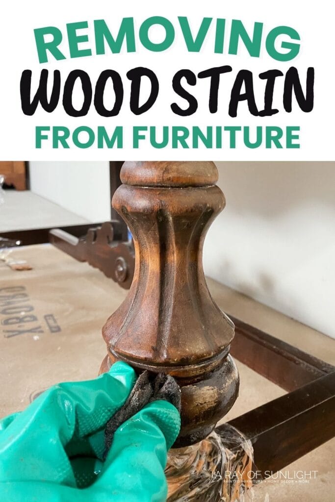 Gloved hand wiping wood stain off a furniture leg with a cloth; text says Removing Wood Stain from Furniture.