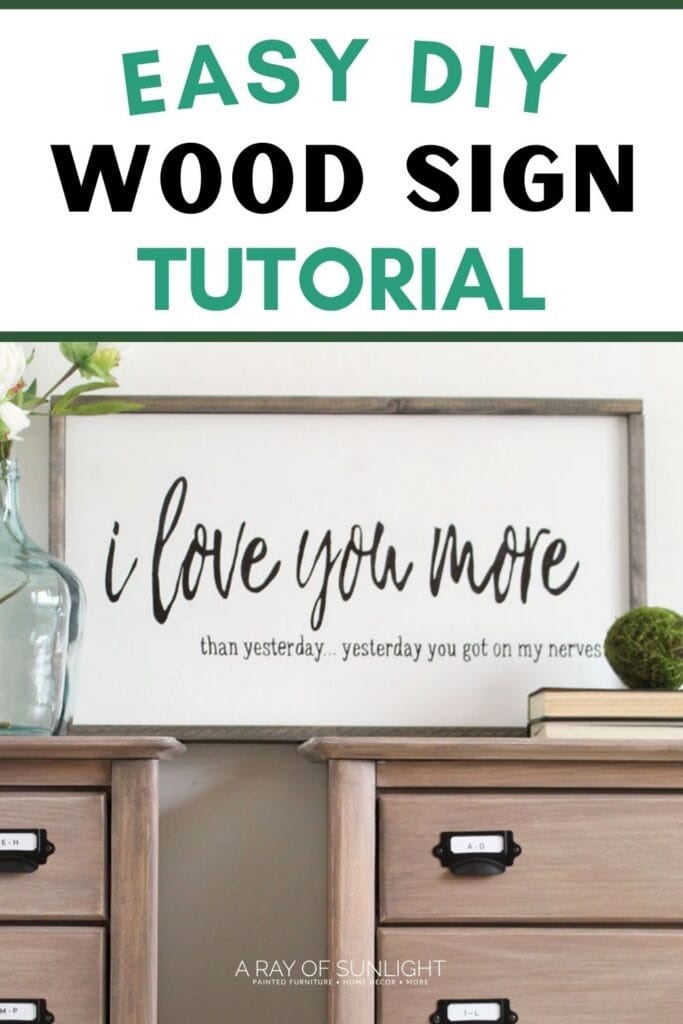 Framed wood sign says I love you more