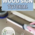 Hand painting a wooden board with a brush; text reads Easy DIY Wood Sign Tutorial above.