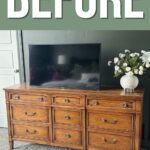Orange wooden dresser with a TV and a vase of white flowers on top, with the word BEFORE above.