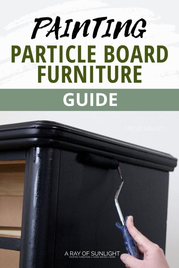 Hand painting black paint on furniture with a roller, text reads Painting Particle Board Furniture Guide..