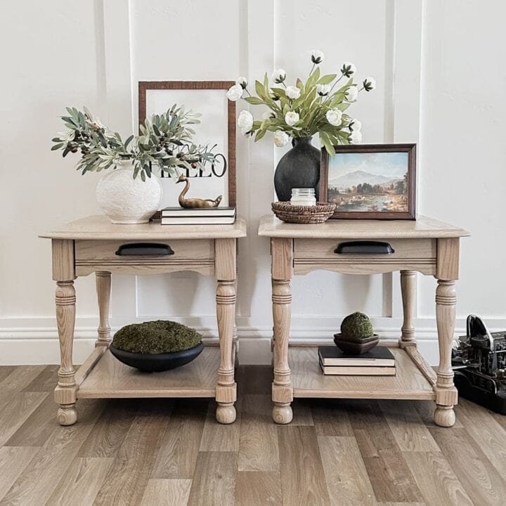 Two wooden side tables with decor