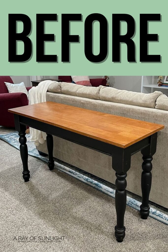 A wooden table with black legs sits behind a beige sofa; BEFORE is written at the top.