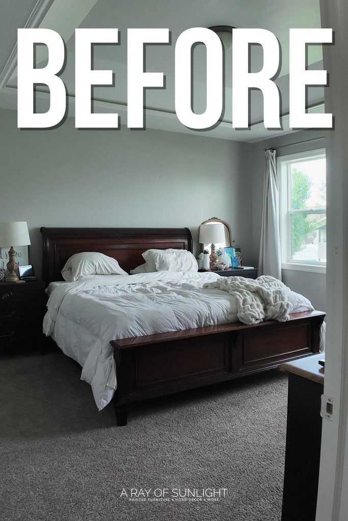 Bedroom with a dark wood bed frame and white bedding, labeled BEFORE.